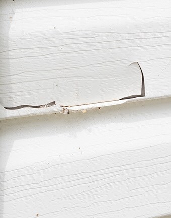 cracked siding on a home