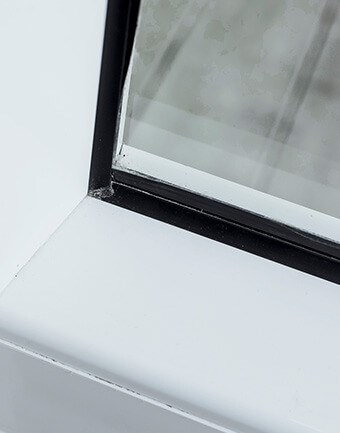 Window with a broken seal on a home in North Carolina