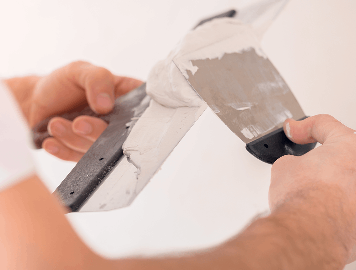 drywall repair in progress in a home