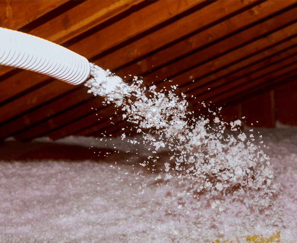 insulation being added to an attic